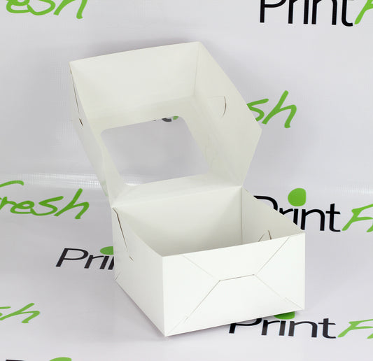 Ciento de Cajas Cuadradas con Ventana de Acetato. Medidas: 19.5x19.5x11 CM.