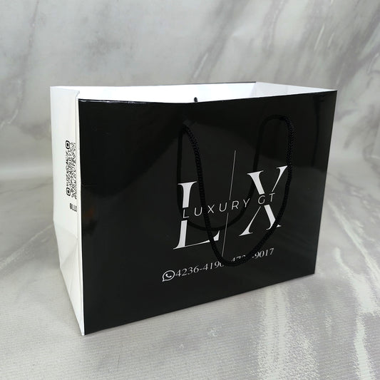 Ciento de Bolsas Tipo Boutique Impresas en Papel Sintético Laminadas Full Color Medidas: 18x19x9cm