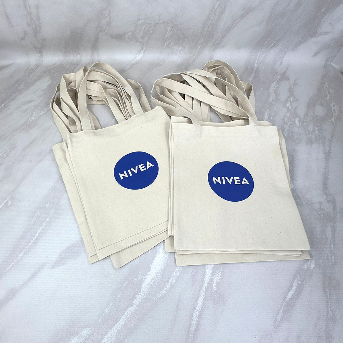 12 Bolsas Premium de Lona Stretch para Eventos o Lanzamientos de Productos. Medida 30x35 cm