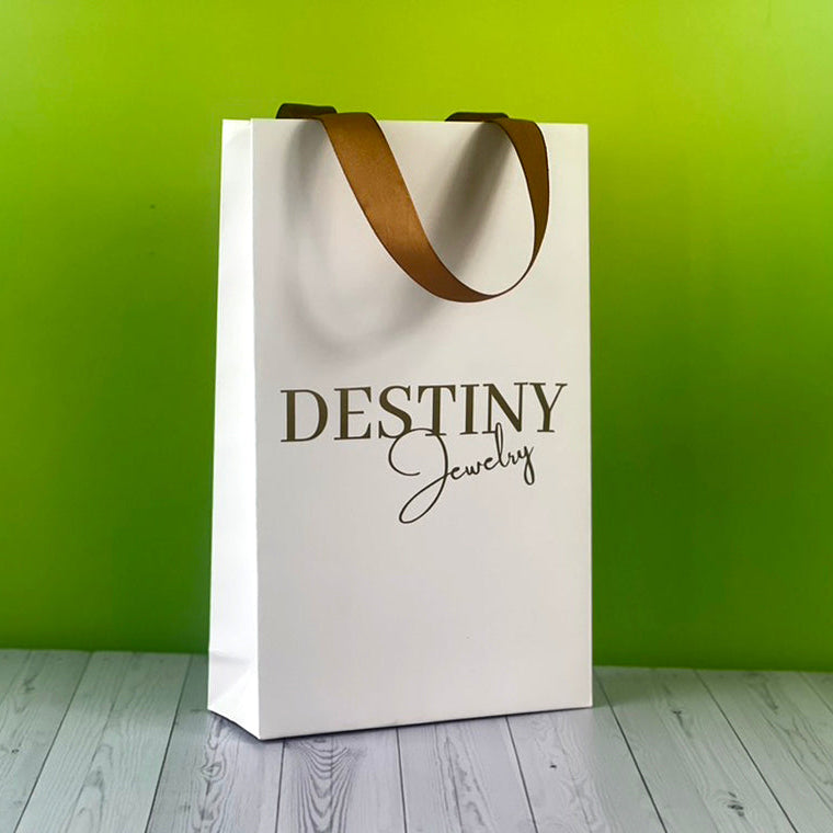 Ciento de Bolsas Boutique con Vinil Adhesivo Medidas 23x42x8cm.