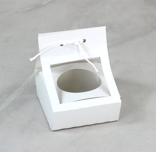 Ciento de Cajas para Candela Aromática, Medidas: 10x10x4 cm. Medidas Círculo: 6.5 cm.