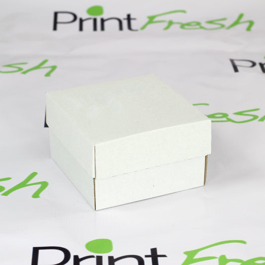 200 Cajas Blancas de Carton Micro Corrugado Medidas: 13x13x8 cm.