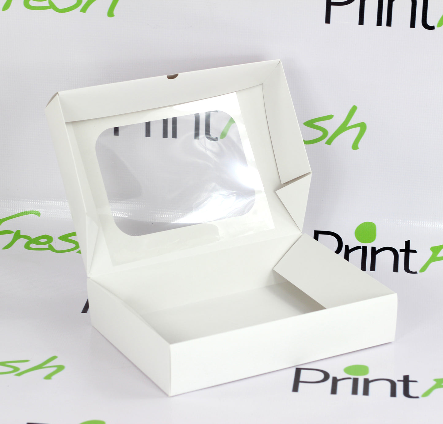 Ciento de Cajas Rectangulares con Ventana de Acetato. Medidas: 28.5x20.5x6 CM.